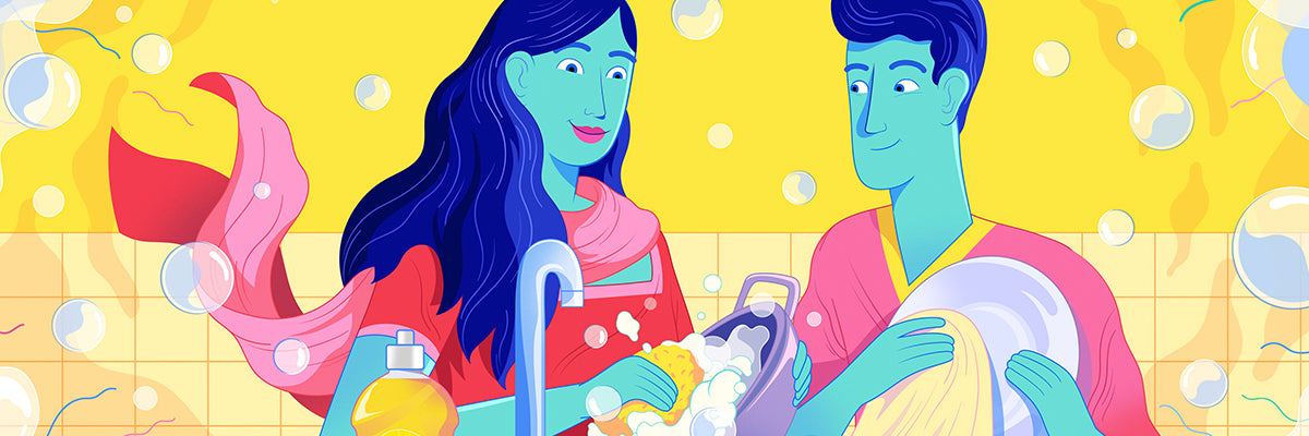 A man and woman washing dishes together with Vim dish soap